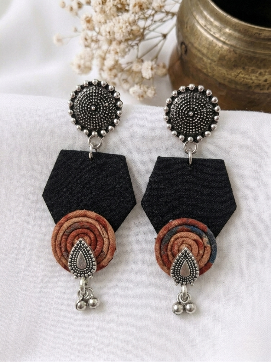 Black Spiral Drop Pentagons